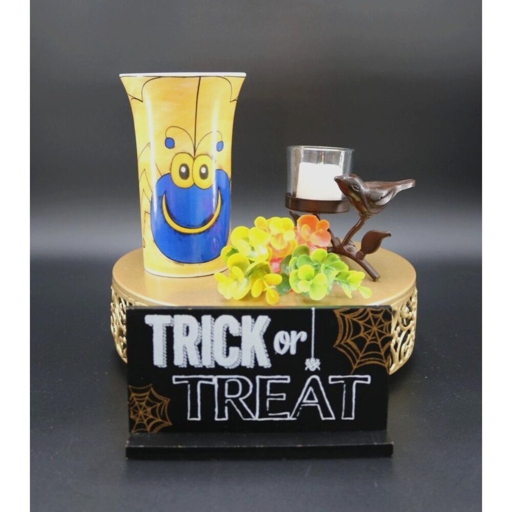 Halloween mug featuring funny, yellow spider design. NWT. Vintage mug from Emera